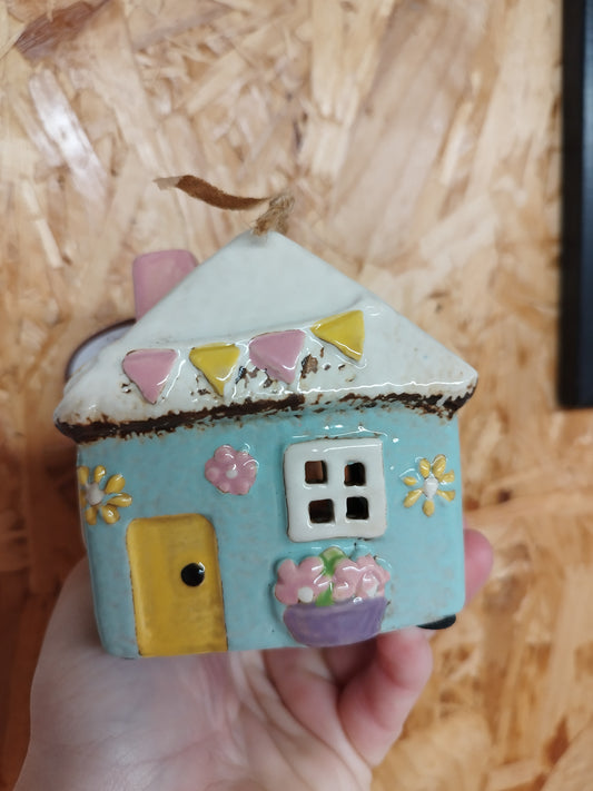 Village pottery teal garden house